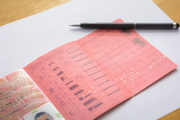 Inside a french driver licence with a pen