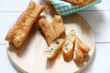 Chinese traditional food, deep fried bread stick normally eaten with rice porridge or spread with...