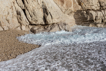 Waves on a pebble beach

