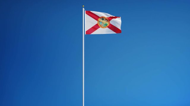 Florida (U.S. state) flag waving in slow motion against blue sky, seamlessly looped, long shot isolated on alpha channel with black and white matte, perfect for film, news, composition