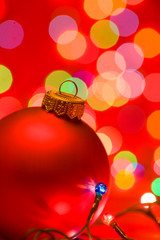 Christmas background with bauble and lights