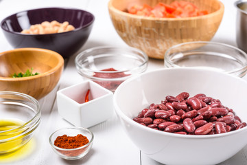 Fresh Food Ingredients On White Wood Kitchen Table