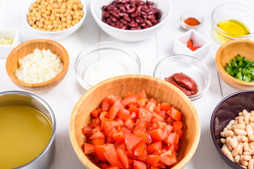 Fresh Food Ingredients On White Wood Kitchen Table