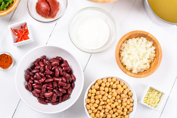 Fresh Food Ingredients On White Wood Kitchen Table