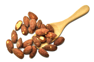 almonds with wood spoon isolated on the white background.