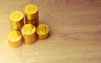 Chinese new year decoration, golden bullion, golden coins on woo
