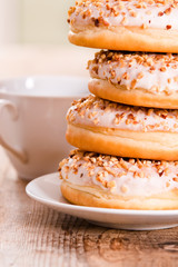 Sweet donuts with sprinkles. 