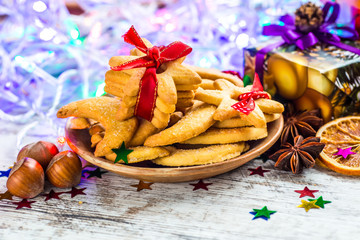 Christmas cookies with ginger decorated with red ribbon