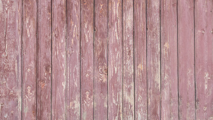Background of wooden red old fence