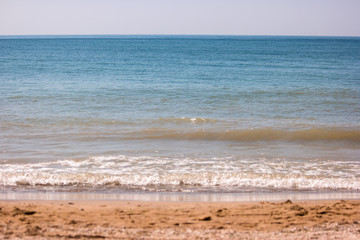 Sea and sand. Horizon with blue water. Great spot for summer rest. Small piece of paradise.