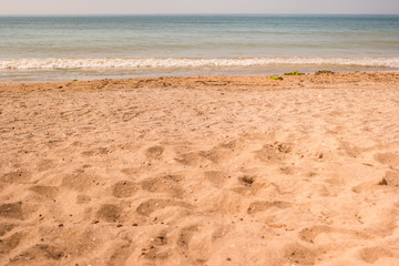 Sand on sea beach. Horizon with water. Great place for summer rest. Paradise away from civilization.