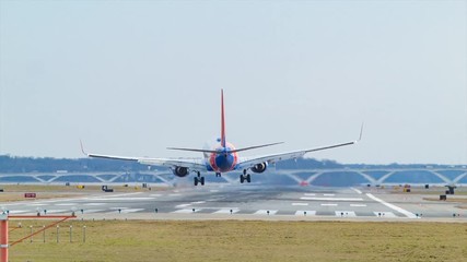 Southwest Airlines Jet Airplane Landing on Runway at Ronald Reagan National Airport DCA in Washington DC