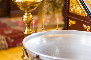 Candlelight in christian church, wedding ceremony, glans, altar