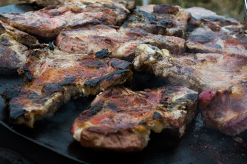 Grilling meat on wood stove