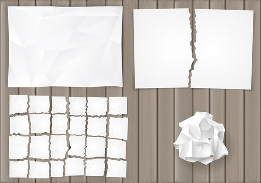 Set creasy and torn sheets of white paper on the background of the old board. Vector graphics