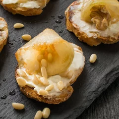Deurstickers Canape with ricotta cheese, pears, nuts and honey © 13smile