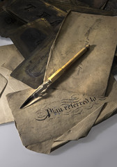 vintage pen and antique brass stencils
