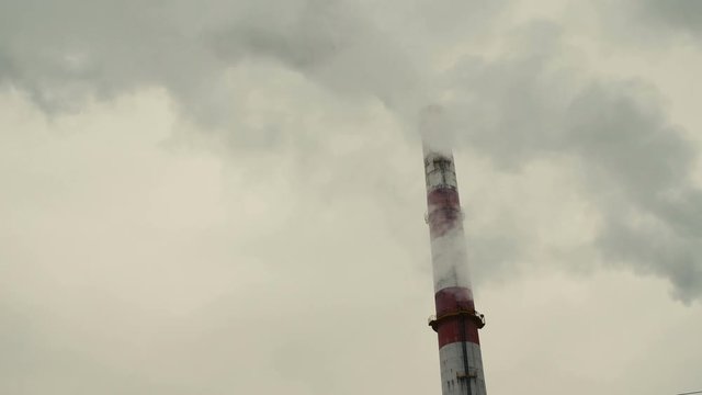 Air pollution by smoke coming out of factory chimneys. 4k