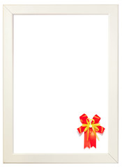 Red ribbon decorated on right corner of white frame, season gree