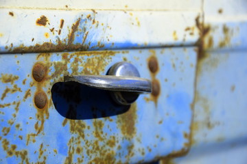 vintage handle on rusted tractor 