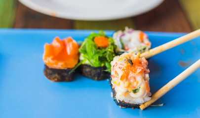 Dirty flies on a sushi