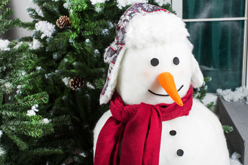 Happy snowman. Christmas card. Winter scene with snowman on forest background. Christmas background 