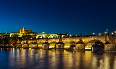 View of the Lesser Bridge Tower of Charles Bridge (Karluv Most) and Prague Castle, Czech Republic.