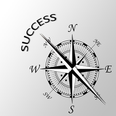 Illustration of success written aside compass