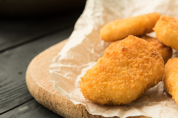 Ready chicken nuggets on a paper