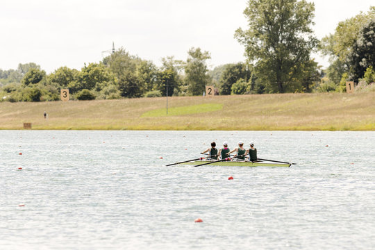 Rowers in rowing boats in a lake