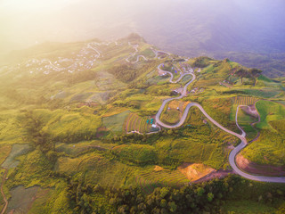 Aerial view of crooked path of road on the mountain, Shot from d