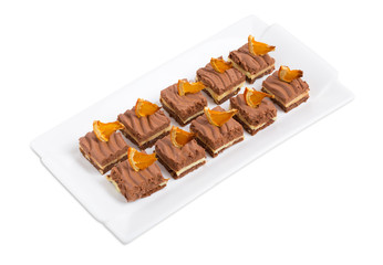 Delicious chocolate brownies with orange creme.