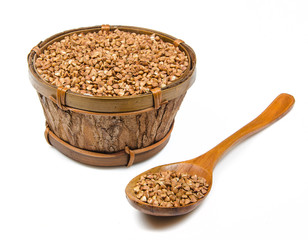 wooden bowl with buckwheat
