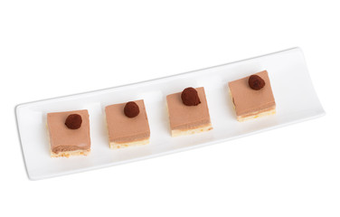 Delicious mousse cakes with chocolate truffles.