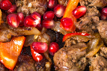 Stewed chicken livers with paprika.