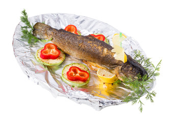 Delicious grilled trout with vegetables.