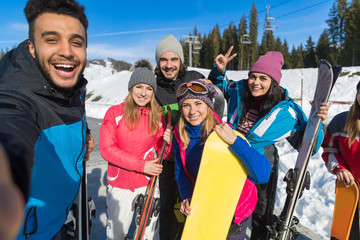 People Group With Snowboard And Ski Resort Snow Winter Mountain Cheerful Friends Taking Selfie Photo Having Fun