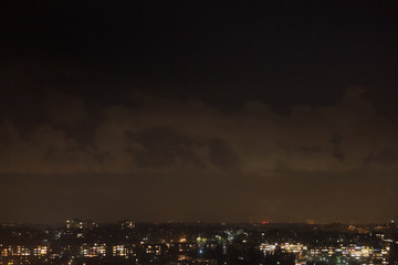 Fototapeta na wymiar Night city landscape. Evening city sky. Urban background.