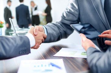 concept - benefits from successful cooperation. the handshake bu