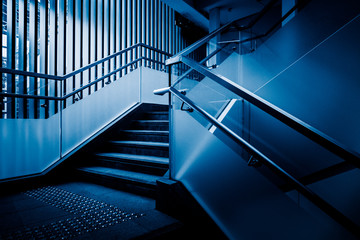 interior view of modern office building in blue tone.