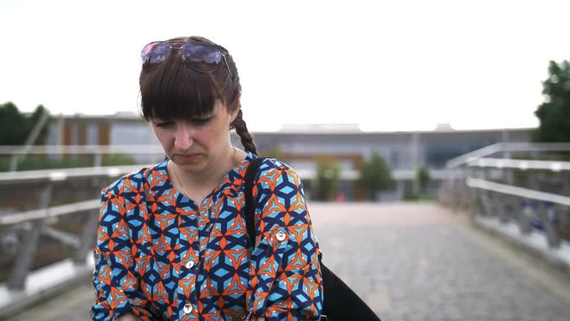 woman has a stomach ache, woman is experiencing pain