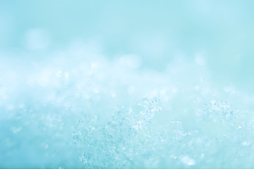 Snow bright abstract winter background close-up bokeh