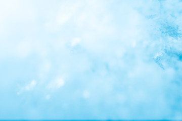 Snow bright abstract winter background close-up bokeh