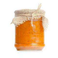 Canned vegetables in glass jars isolated on white background