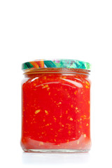 Canned vegetables in glass jars isolated on white background