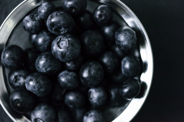 Fresh ripe pile of blueberries macro close up