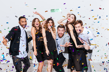 Group of happy young people celebrating and having fun together - obrazy, fototapety, plakaty
