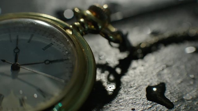 Setting Classic Pocket Watch Ticking in Slow Motion. Small pocket clock in man hands close up. Close-up of hand opening pocket watch. Macro shot 