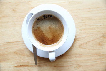 cappuccino coffee on wood background