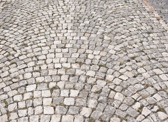 Texture of old cobblestone pavement.